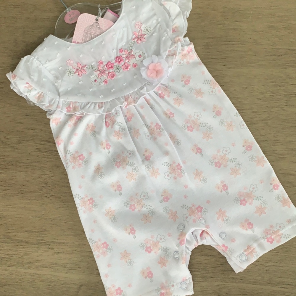 Floral one piece. NWT